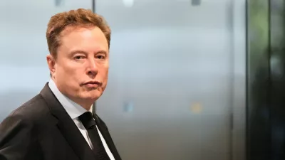 Elon Musk arrives at the U.S. District Court in Oakland, Calif., Tuesday, April 28, 2026. (AP Photo/Godofredo A. V&aacute;squez)