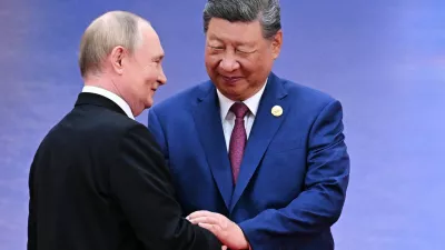 FILE - Russian President Vladimir Putin, left, and Chinese President Xi Jinping greet each other in Tianjin, China, on Aug. 31, 2025. (Sergei Bobylev, Sputnik, Kremlin Pool Photo via AP, File)