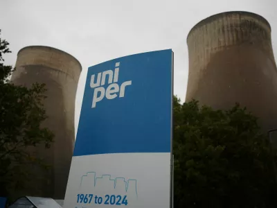 FILE PHOTO: File Photo: Signage is seen in front of the cooling towers at Uniper's Ratcliffe-on-Soar power station the day after it was taken offline, in Ratcliffe-on-Soar, Britain, October 1, 2024. REUTERS/Phil Noble/File Photo/File Photo