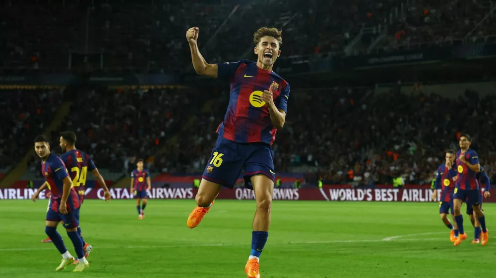 Soccer Football - UEFA Champions League - FC Barcelona v Olympiacos - Estadi Lluis Olimpic Companys, Barcelona, Spain - October 21, 2025 FC Barcelona's Fermin Lopez celebrates scoring their fifth goal REUTERS/Albert Gea
