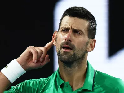 Tennis - Australian Open - Melbourne Park, Melbourne, Australia - January 24, 2026 Serbia's Novak Djokovic celebrates and gestures to crowd after winning his third round match against Netherlands' Botic van de Zandschulp REUTERS/Tingshu Wang  TPX IMAGES OF THE DAY