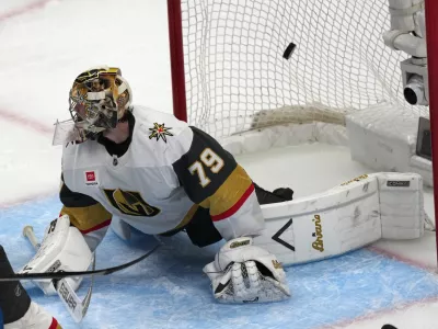 Vegas Golden Knights goaltender Carter Hart allows a goal off the stick of Colorado Avalanche left wing Gabriel Landeskog during the third period in Game 1 of the Western Conference finals NHL hockey Stanley Cup playoff series Wednesday, May 20, 2026, in Denver. (AP Photo/David Zalubowski)