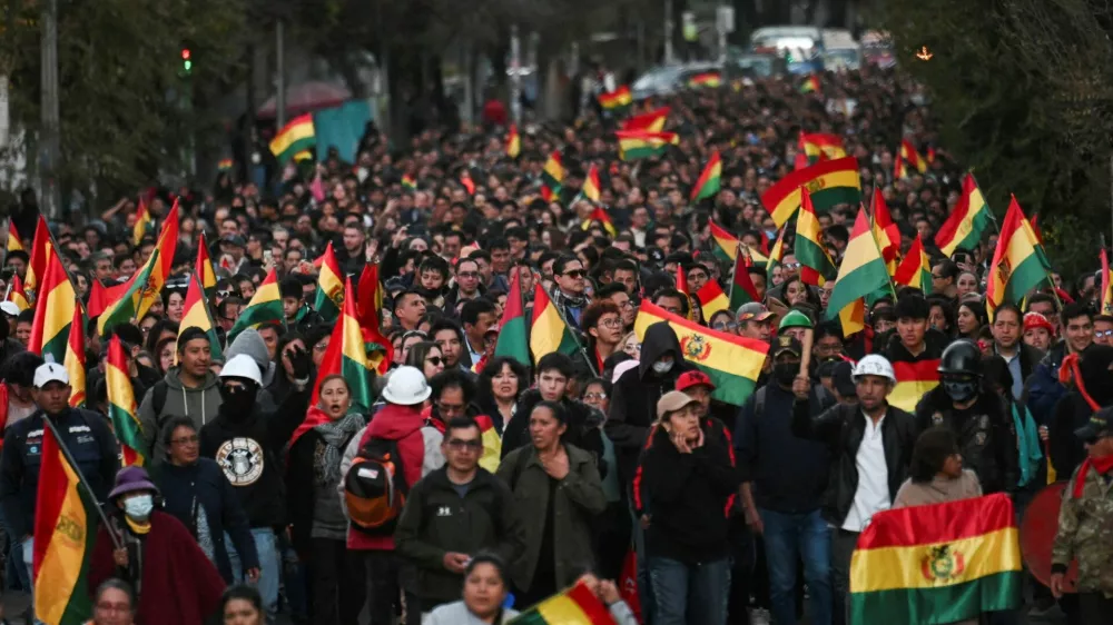 Demonstrators take part in a march, which organizers have dubbed a "defense of democracy," to rally against road blockades and what they call pressure measures used by protesters calling for the resignation of Bolivia's President Rodrigo Paz, amid the country's economic and fuel crisis, in La Paz, Bolivia, May 20, 2026. REUTERS/Claudia Morales  REFILE - REWRITING FOR CLARITY AND ADDING ATTRIBUTION