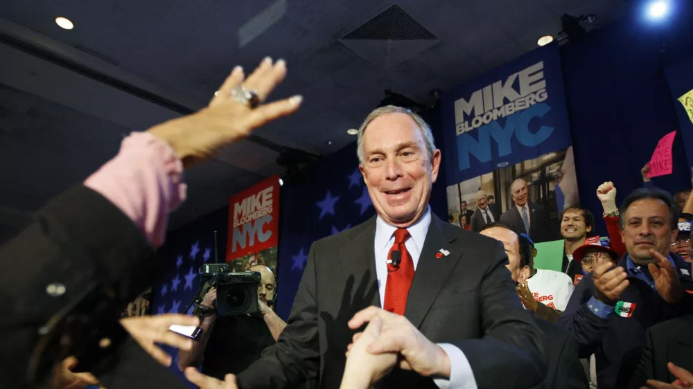 New York City Mayor Michael Bloomberg greets supporters after his election win in New York, November 3, 2009.  REUTERS/Shaun Best (UNITED STATES POLITICS ELECTIONS IMAGES OF THE DAY)
