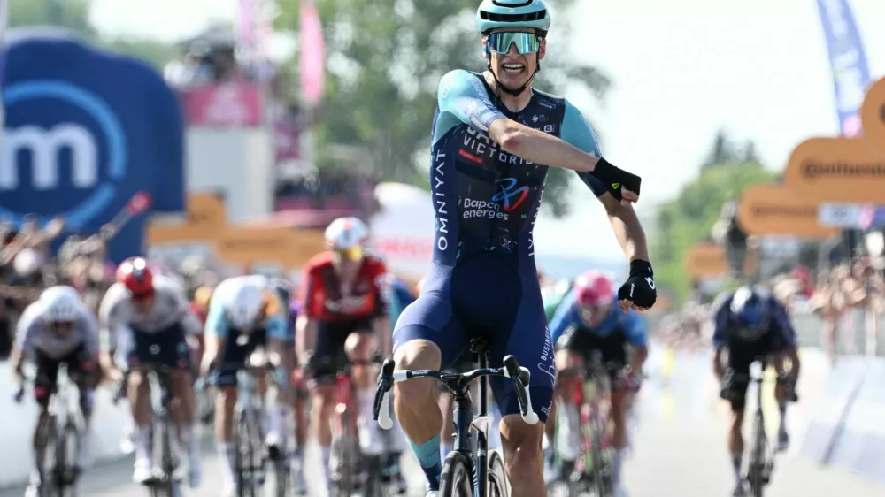 Cycling - Giro d'Italia - Stage 12 - Imperia to Novi Ligure - Italy - May 21, 2026 Bahrain - Victorious' Alec Segaert celebrates winning stage 12 REUTERS/Jennifer Lorenzini