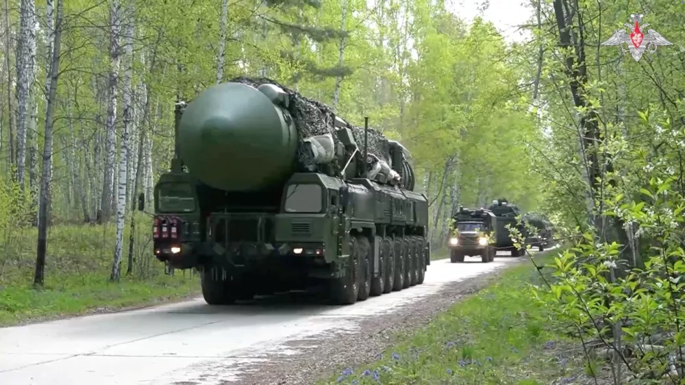Russia's mobile strategic missile system unit drives during a nuclear forces exercise at an unidentified location in Russia, in this still image taken from handout footage released on May 21, 2026. Russian Defence Ministry/Handout via REUTERS ATTENTION EDITORS - THIS IMAGE WAS PROVIDED BY A THIRD PARTY. NO RESALES. NO ARCHIVES. MANDATORY CREDIT.