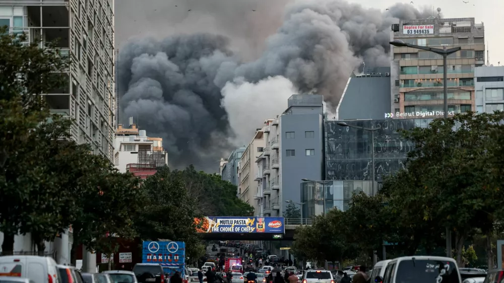 FILE PHOTO: Smoke rises after an Israeli strike in central Beirut's Bachoura neighbourhood, following an escalation between Hezbollah and Israel, amid the U.S.-Israeli conflict with Iran, in Beirut, Lebanon, March 12, 2026. REUTERS/Claudia Greco/File Photo