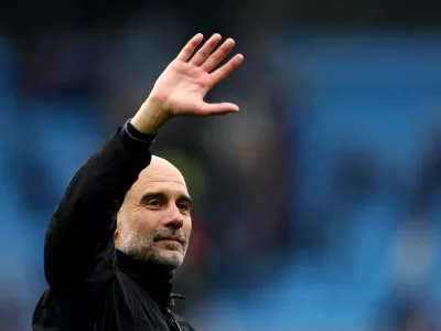 FILE PHOTO: Soccer Football - Premier League - Manchester City v Brentford - Etihad Stadium, Manchester, Britain - May 9, 2026 Manchester City manager Pep Guardiola celebrates after the match REUTERS/Chris Radburn/File PhotoEDITORIAL USE ONLY. NO USE WITH UNAUTHORIZED AUDIO, VIDEO, DATA, FIXTURE LISTS, CLUB/LEAGUE LOGOS OR 'LIVE' SERVICES. ONLINE IN-MATCH USE LIMITED TO 120 IMAGES, NO VIDEO EMULATION. NO USE IN BETTING, GAMES OR SINGLE CLUB/LEAGUE/PLAYER PUBLICATIONS. PLEASE CONTACT YOUR ACCOUNT REPRESENTATIVE FOR FURTHER DETAILS..