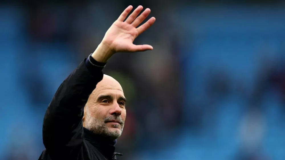 FILE PHOTO: Soccer Football - Premier League - Manchester City v Brentford - Etihad Stadium, Manchester, Britain - May 9, 2026 Manchester City manager Pep Guardiola celebrates after the match REUTERS/Chris Radburn/File PhotoEDITORIAL USE ONLY. NO USE WITH UNAUTHORIZED AUDIO, VIDEO, DATA, FIXTURE LISTS, CLUB/LEAGUE LOGOS OR 'LIVE' SERVICES. ONLINE IN-MATCH USE LIMITED TO 120 IMAGES, NO VIDEO EMULATION. NO USE IN BETTING, GAMES OR SINGLE CLUB/LEAGUE/PLAYER PUBLICATIONS. PLEASE CONTACT YOUR ACCOUNT REPRESENTATIVE FOR FURTHER DETAILS..