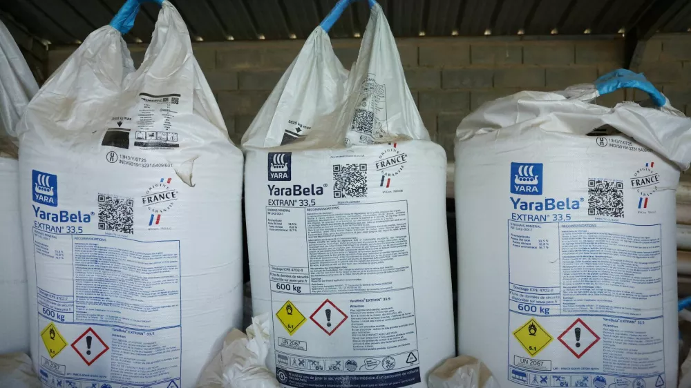Bags of YaraBela's nitrogen fertilizers white pellets are seen in a French farmer's barn in Arville, France, May 7, 2026. REUTERS/Alice Sacco