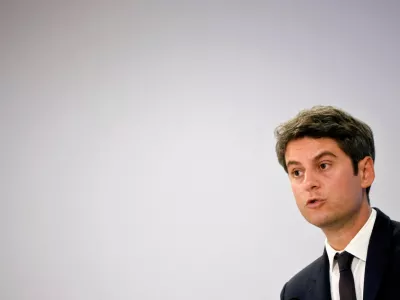 FILE PHOTO: French Prime Minister Gabriel Attal speaks during a press conference entitled "The day after" to talk about the key measures in his party's programme for the hundred days after the upcoming French parliamentary elections, at the headquarters of the presidential majority group "Ensemble pour la Republique" in Paris, France, June 20, 2024. REUTERS/Johanna Geron/File Photo