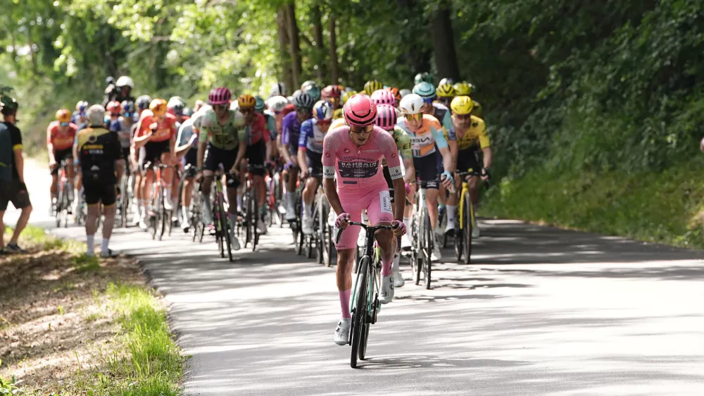 Portugal's Afonso Oliveira Eulalio of Bahrain Victorious, front, during the 12th stage of the Giro d'Italia cycling race, from Imperia to Novi Ligure, Italy, Thursday, May 21, 2026. (Marco Alpozzi/LaPresse via AP)