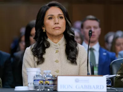 FILE - Director of National Intelligence Tulsi Gabbard listens during the Senate Committee on Intelligence hearings on Capitol Hill, March 18, 2026, in Washington. (AP Photo/Jose Luis Magana, File)
