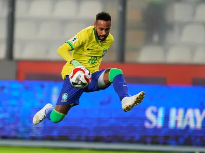 FILE- Brazil's Neymar controls the ball during a World Cup qualifying soccer match against Peru at National stadium in Lima, Peru, Tuesday, Sept. 12, 2023. (AP Photo/Martin Mejia, File)