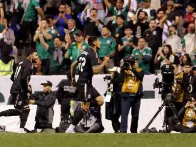 Soccer Football - International Friendly - Mexico v Ghana - Estadio Cuauhtemoc, Puebla, Mexico - May 22, 2026 Mexico's Guillermo Martinez celebrates scoring their second goal with Alexis Vega REUTERS/Henry Romero