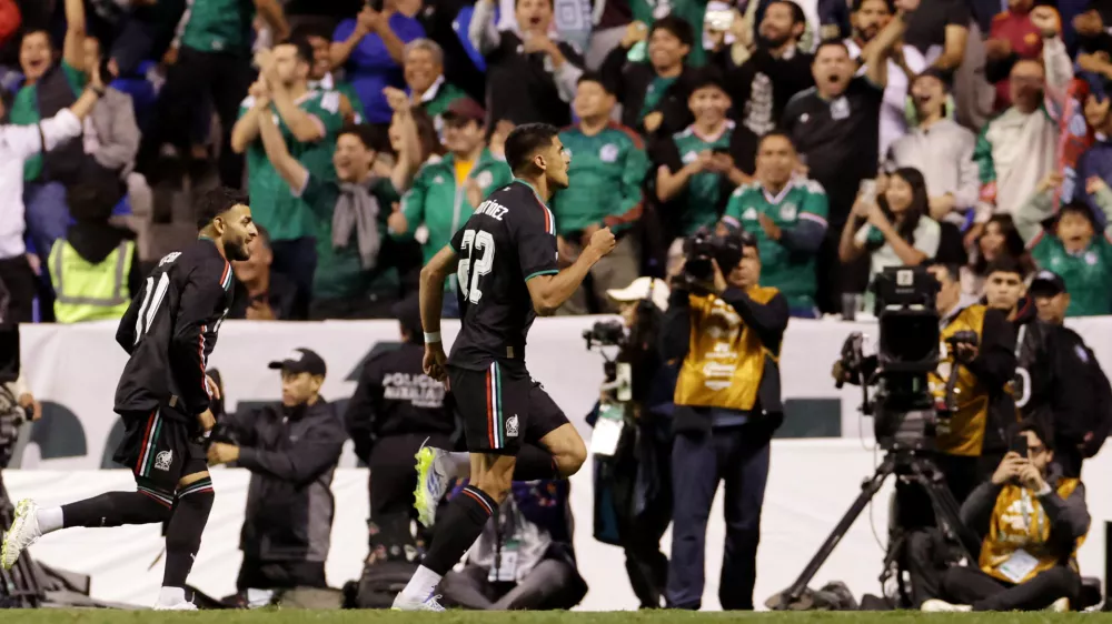 Soccer Football - International Friendly - Mexico v Ghana - Estadio Cuauhtemoc, Puebla, Mexico - May 22, 2026 Mexico's Guillermo Martinez celebrates scoring their second goal with Alexis Vega REUTERS/Henry Romero