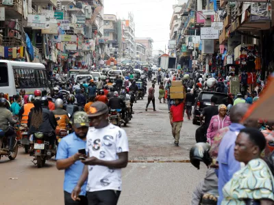 Motorcycle taxis carry passengers following a resurgence of Ebola involving the Bundibugyo strain, a rare variant of the virus with no approved vaccine currently available, along Ben Kiwanuka street in Kampala, Uganda May 21, 2026. REUTERS/Abubaker Lubowa