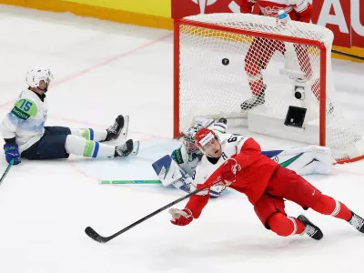 Ice Hockey - IIHF World Championships - Group B - Denmark v Slovenia - BCF Arena, Fribourg, Switzerland - May 23, 2026 Denmark's Patrick Russell scores their third goal REUTERS/David W Cerny   TPX IMAGES OF THE DAY