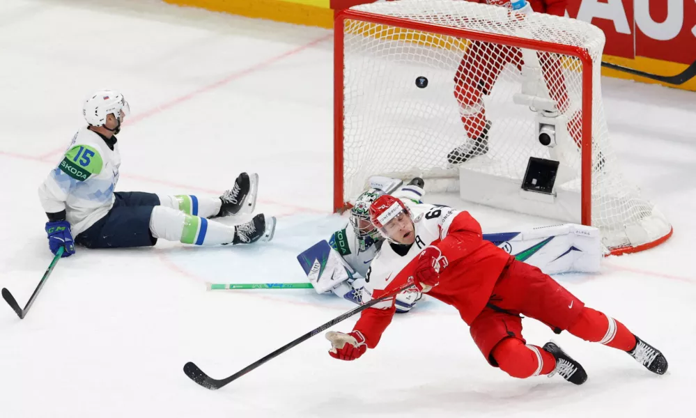 Ice Hockey - IIHF World Championships - Group B - Denmark v Slovenia - BCF Arena, Fribourg, Switzerland - May 23, 2026 Denmark's Patrick Russell scores their third goal REUTERS/David W Cerny   TPX IMAGES OF THE DAY