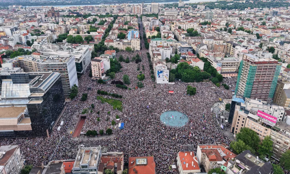 Anti-government protesters take part in a rally led by Serbia's protesting university students who are pushing for major political changes in the Balkan country run by President Aleksandar Vucic, in Belgrade, Serbia, Saturday, May. 23, 2026. (AP Photo/Armin Durgut)