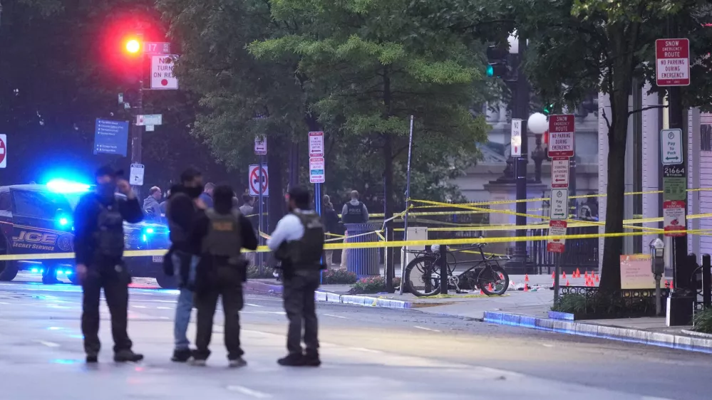 U.S. Secret Service Police are seen on a crime scene after responding to reports of shots fired near the White House, Saturday, May 23, 2026, in Washington. (AP Photo/Alex Brandon)
