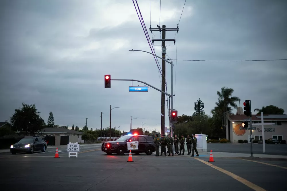 Law enforcement officers enforce a roadblock near an evacuation zone, after residents were ordered to evacuate because of a failing tank containing methyl methacrylate, a flammable liquid used in the aerospace industry, in Stanton, California, U.S., May 23, 2026, REUTERS/Ed Ou
