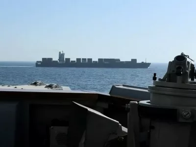 A view of Iranian-flagged cargo ship M/V Touska as the U.S. Navy Arleigh Burke-class Aegis guided missile destroyer USS Spruance conducts its interception in a location given as the north Arabian Sea, in this screen capture from a video released April 19, 2026. CENTCOM/Handout via REUTERS  THIS IMAGE HAS BEEN SUPPLIED BY A THIRD PARTY. THIS IMAGE WAS PROCESSED BY REUTERS TO ENHANCE QUALITY, AN UNPROCESSED VERSION HAS BEEN PROVIDED SEPARATELY. VERIFICATION -Identity of the ship confirmed as Touska by shape which matched file imagery of the vessel. -Exact date not verified but no older version found posted online before April 19. -Vessel tracking data showed the most recent location of Touska near the Gulf of Oman on April 19.