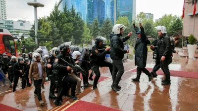 Turkish riot police enter the headquarters of the main opposition Republican People's Party (CHP) to evict its ousted leadership, after authorities ordered enforcement of a court ruling removing the party's leadership from the building, in Ankara, Turkey, May 24, 2026. REUTERS/Efekan Akyuz   TPX IMAGES OF THE DAY