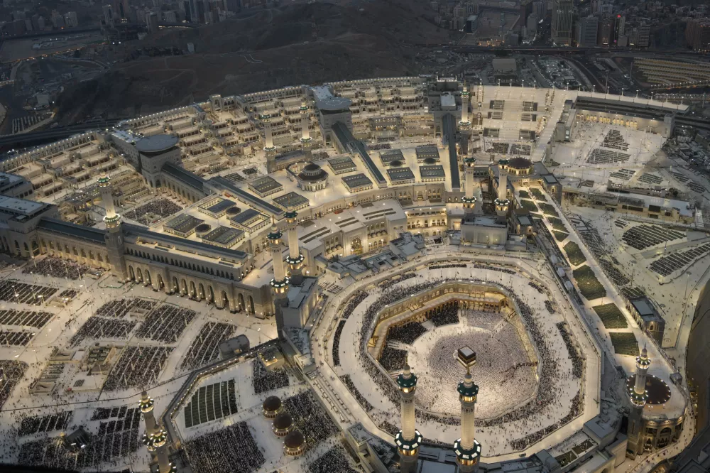 Muslim pilgrims pray at the Grand Mosque in the holy city of Mecca during the annual hajj pilgrimage, Saudi Arabia, Sunday, May 24, 2026. (AP Photo/Altaf Qadri)