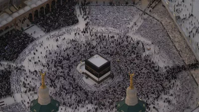 Muslim pilgrims circumambulate the Kaaba, Islam's holiest site, at the Grand Mosque, during the annual Hajj pilgrimage in Mecca, Saudi Arabia, Sunday, May 24, 2026. (AP Photo/Altaf Qadri)
