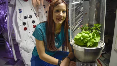 BOULDER, CO - APRIL 12: Heather Hava, a 'space gardener,' picked up an MIT award for her research. She's is also working on growing plants in space that not only will offer nutrients but improve astronauts' happiness. Here she stands with her invention SPOT April 12, 2016 a self-contained planting container where plants will grow. The plants in this photo were placed there to show what the container will look like when plants are growing. (Photo By John Leyba/The Denver Post via Getty Images)