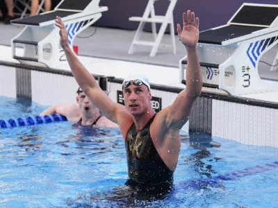 Kristian Gkolomeev, of Greece, celebrates after winning the men's 100-meter freestyle final at the Enhanced Games in Las Vegas, Sunday, May 24, 2026. (AP Photo/Jae C. Hong)