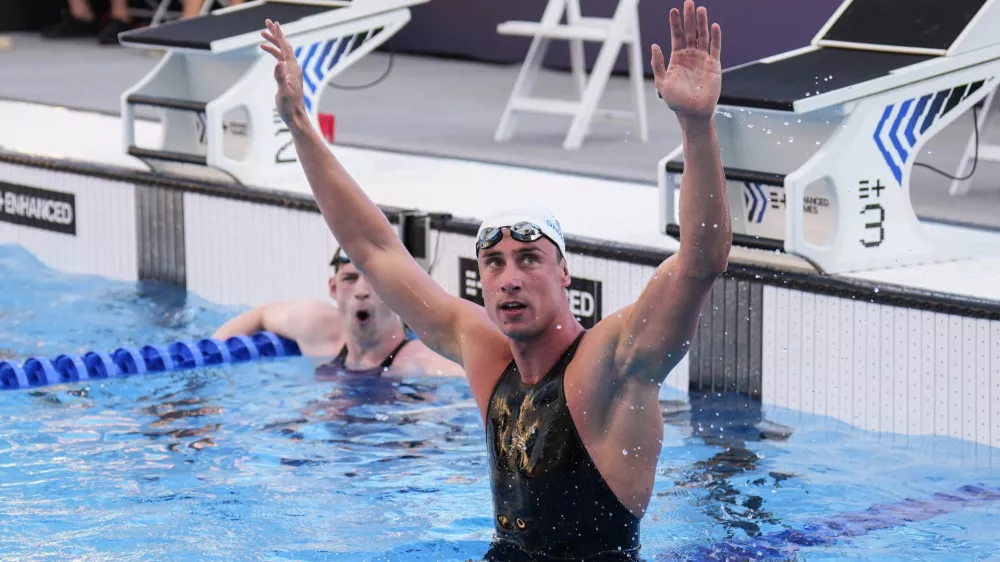Kristian Gkolomeev, of Greece, celebrates after winning the men's 100-meter freestyle final at the Enhanced Games in Las Vegas, Sunday, May 24, 2026. (AP Photo/Jae C. Hong)