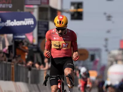 Norway's Fredrik Dversnes Lavik celebrates winning the 15th stage of the Giro d'Italia cycling race, from Voghera to Milan, Italy, Sunday, May 24, 2026. (Marco Alpozzi/LaPresse via AP)
