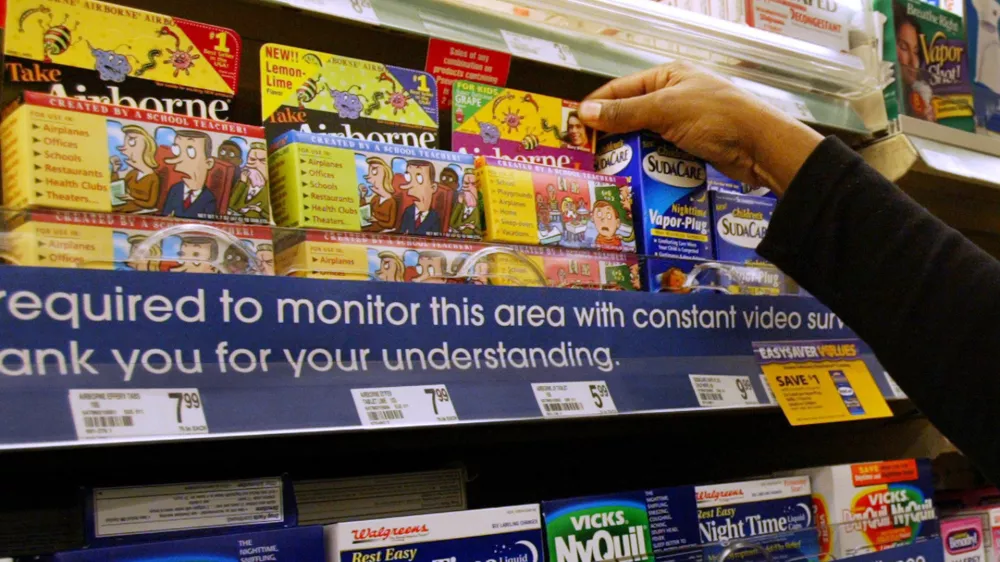 Airborne, an effervescent tablet for cold sufferers containing Chinese herbs, vitamins and echinacea, sits next to mainstream drugs at a Walgreens drugstore Friday, Feb. 18, 2005, in Chicago. Airborne follows other homeopathic crossovers that led the way in the early 1990s and is the most recent herbal supplement to take a place next to mainstream drugs on store shelves. (AP Photo/Nam Y. Huh)
