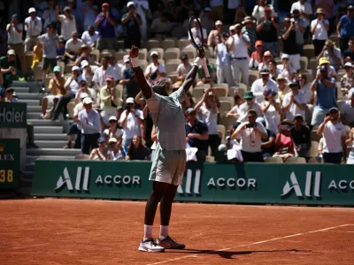 Tennis - French Open - Roland Garros, Paris, France - May 26, 2026 France's Moise Kouame celebrates after winning his first round match against Croatia's Marin Cilic REUTERS/Guglielmo Mangiapane