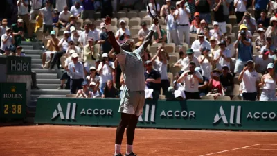 Tennis - French Open - Roland Garros, Paris, France - May 26, 2026 France's Moise Kouame celebrates after winning his first round match against Croatia's Marin Cilic REUTERS/Guglielmo Mangiapane
