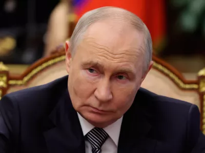 Russian President Vladimir Putin listens to Russian Union of Industrialists and Entrepreneurs Alexander Shokhin during their meeting at the Kremlin in Moscow, Tuesday, May 26, 2026. (Vyacheslav Prokofyev/Sputnik, Kremlin Pool Photo via AP)