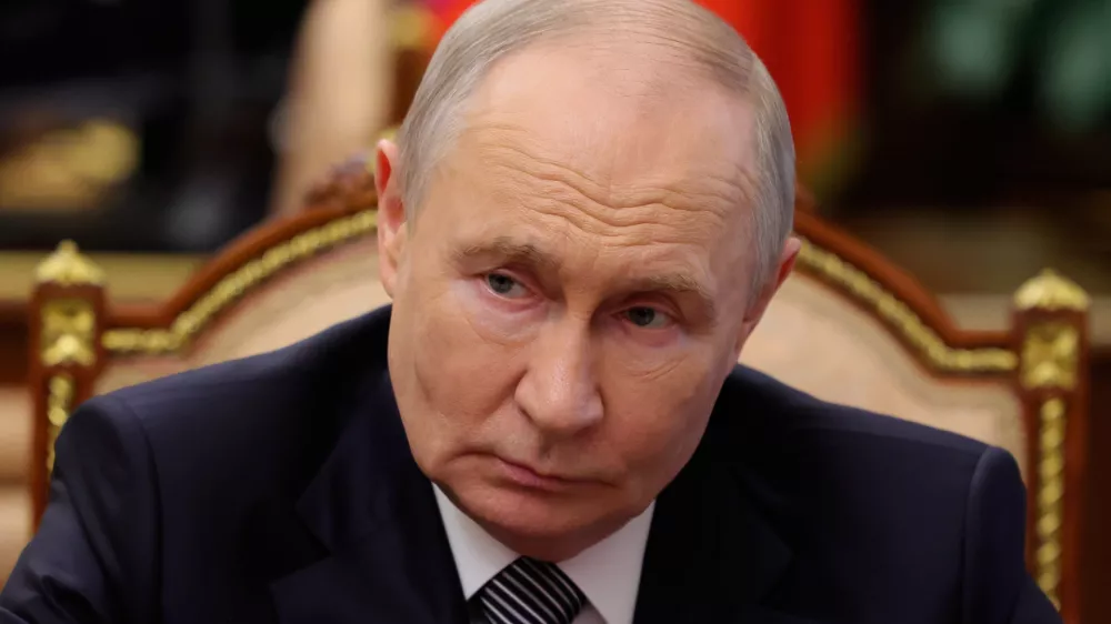 Russian President Vladimir Putin listens to Russian Union of Industrialists and Entrepreneurs Alexander Shokhin during their meeting at the Kremlin in Moscow, Tuesday, May 26, 2026. (Vyacheslav Prokofyev/Sputnik, Kremlin Pool Photo via AP)