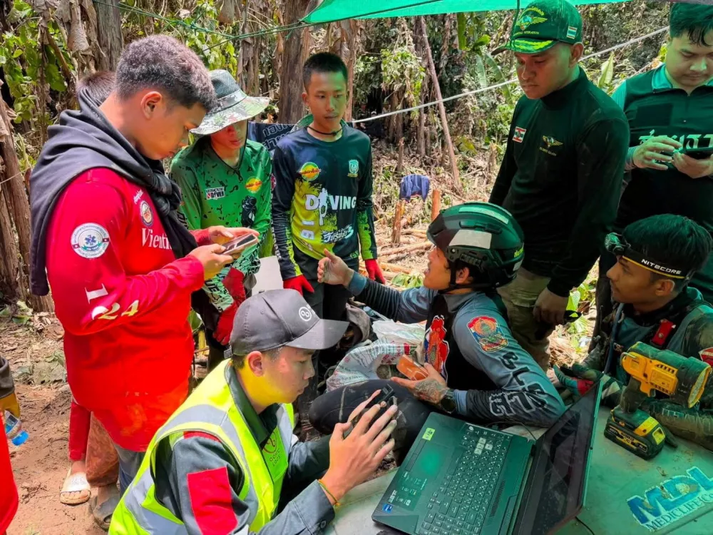 Members of a rescue team work to save seven people trapped in a cave, at a location given as Xaisomboun Province, Laos, in this handout image released May 25, 2026. Metta Tham Kalasin Rescue/Handout via REUTERS THIS IMAGE HAS BEEN SUPPLIED BY A THIRD PARTY. NO RESALES. NO ARCHIVES. MANDATORY CREDIT. VERIFICATION Location and date not verified According to the rescue team, the coordinate of the cave is at the coordinates of 19.069727, 102.969711 Trees, the shed, machines and staff members matched with corroborating social media videos The state-run Lao Phattana News confirmed the engagement of Thai rescue team in the cave No earlier version of the visuals was posted online before May 25 and May 26