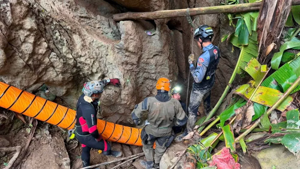 Members of a rescue team work to save seven people trapped in a cave, at a location given as Xaisomboun Province, Laos, in this handout image released May 25, 2026. Metta Tham Kalasin Rescue/Handout via REUTERS THIS IMAGE HAS BEEN SUPPLIED BY A THIRD PARTY. NO RESALES. NO ARCHIVES. MANDATORY CREDIT. VERIFICATION Location and date not verified According to the rescue team, the coordinate of the cave is at the coordinates of 19.069727, 102.969711 Trees, the shed, machines and staff members matched with corroborating social media videos The state-run Lao Phattana News confirmed the engagement of Thai rescue team in the cave No earlier version of the visuals was posted online before May 25 and May 26