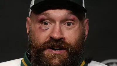 FILE - Britain's boxer Tyson Fury speaks at a press conference after loosing his fight against Ukraine's boxer Oleksandr Usyk for the WBA, WBO, and WBC heavyweight title in Riyadh, Saudi Arabia, Sunday, Dec. 22, 2024.(AP Photo/Frank Augstein, File)