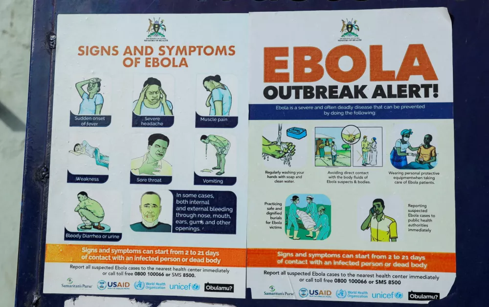 FILE PHOTO: An advocacy poster against the spread of Ebola virus is placed along the walkway at the Platinum Medical Centre, as aid agencies intensify efforts to contain a new Ebola outbreak involving the Bundibugyo Virus in Kampala, Uganda, May 26, 2026. REUTERS/Abubaker Lubowa/File Photo