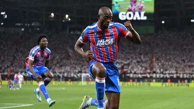 Crystal Palace's Jean-Philippe Mateta celebrates after scoring during the Europa Conference League final soccer match between Crystal Palace and Rayo Vallecano in Leipzig, Germany, Wednesday, May 27, 2026. (Robert Michael/dpa via AP)