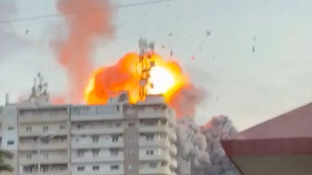 Flames rise following a strike, as the Israeli military says it has begun striking Hezbollah infrastructure in southern Lebanon's Tyre, in Tyre, Lebanon, May 28, 2026, in this screengrab obtained from social media video. Social Media /via REUTERS THIS IMAGE HAS BEEN SUPPLIED BY A THIRD PARTY. NO RESALES. NO ARCHIVES. NEWS USE ONLY.  Verification: - Road layout, buildings and trees matched file and satellite image - Corroborating videos show smoke rising from the same location - Date verified by IDF statement of the attack on Tyre - Israeli military said on Thursday morning that it has begun striking Hezbollah infrastructure in southern Lebanon's Tyre. - Israeli military spokesperson Avichay Adraee warned to attack several locations in Tyre on Thursday morning, including the area where the smoke was seen rising from.