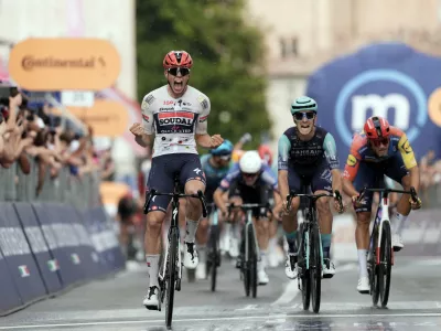 France's Paul Magnier of Soudal Quick-Step wins the 18th stage of the Giro d'Italia cycling race from Fai della Paganella to Pieve di Soligo, Italy, Thursday May 28, 2026. (Massimo PaoloneLaPresse via AP)