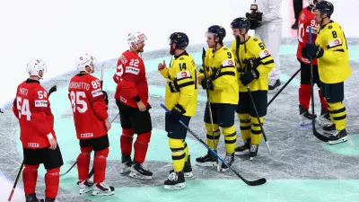Ice Hockey - IIHF World Championships - Quarter Final - Switzerland v Sweden - Swiss Life Arena, Zurich, Switzerland - May 28, 2026 Switzerland's Nino Niederreiter speaks with Sweden's Mattias Ekholm after the match REUTERS/Denis Balibouse