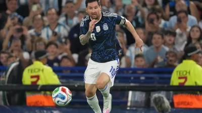 FILE - Argentina's Lionel Messi dribbles during a friendly soccer match against Zambia in Buenos Aires, Argentina, Tuesday, March 31, 2026. (AP Photo/Gustavo Garello, File)