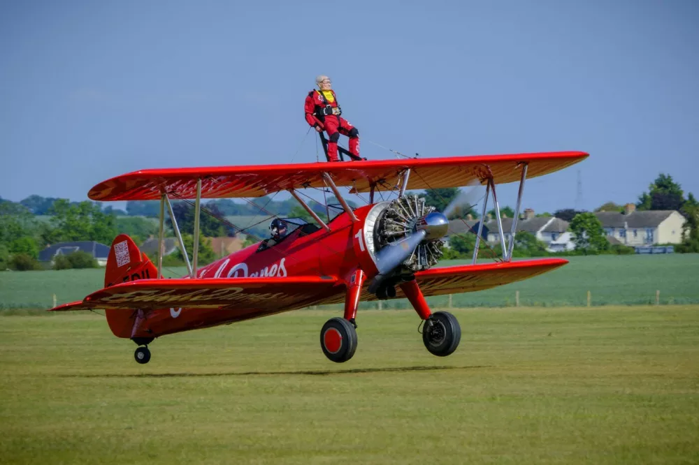 Duxford, UK, 23, May,2026 98-year-old Harry Heasman, became the oldest person to wing walk on an aircraft with the feat officially recognised by Guinness World Records at IWM Duxford Material must be credited "The Times/News Licensing" unless otherwise agreed. 100% surcharge if not credited. Online rights need to be cleared separately. Strictly one time use only subject to agreement with News Licensing,Image: 1105440469, License: Rights-managed, Restrictions: Usage is subject to our terms and conditions. Electronic storage is prohibited., Model Release: no 