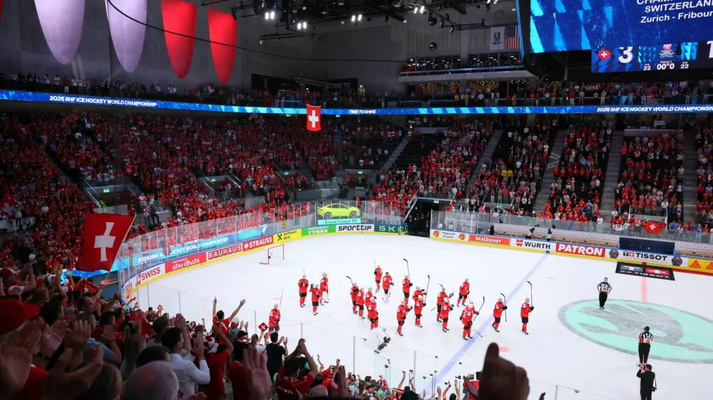 Ice Hockey - IIHF World Championships - Quarter Final - Switzerland v Sweden - Swiss Life Arena, Zurich, Switzerland - May 28, 2026 Switzerland players celebrate after the match REUTERS/Denis Balibouse